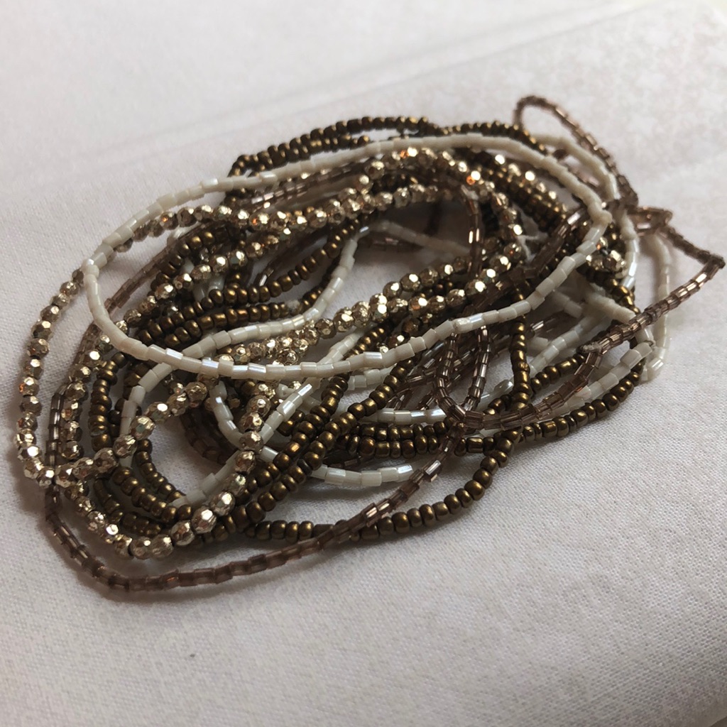 Stack Of Stretchy Accent Bracelets 8$